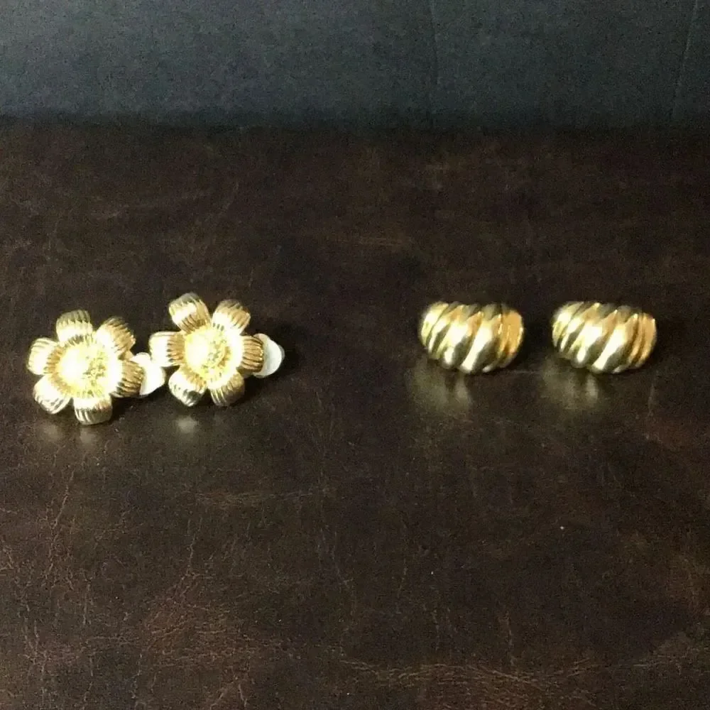 Earrings two pair of clip on gold tone, flower, and shell